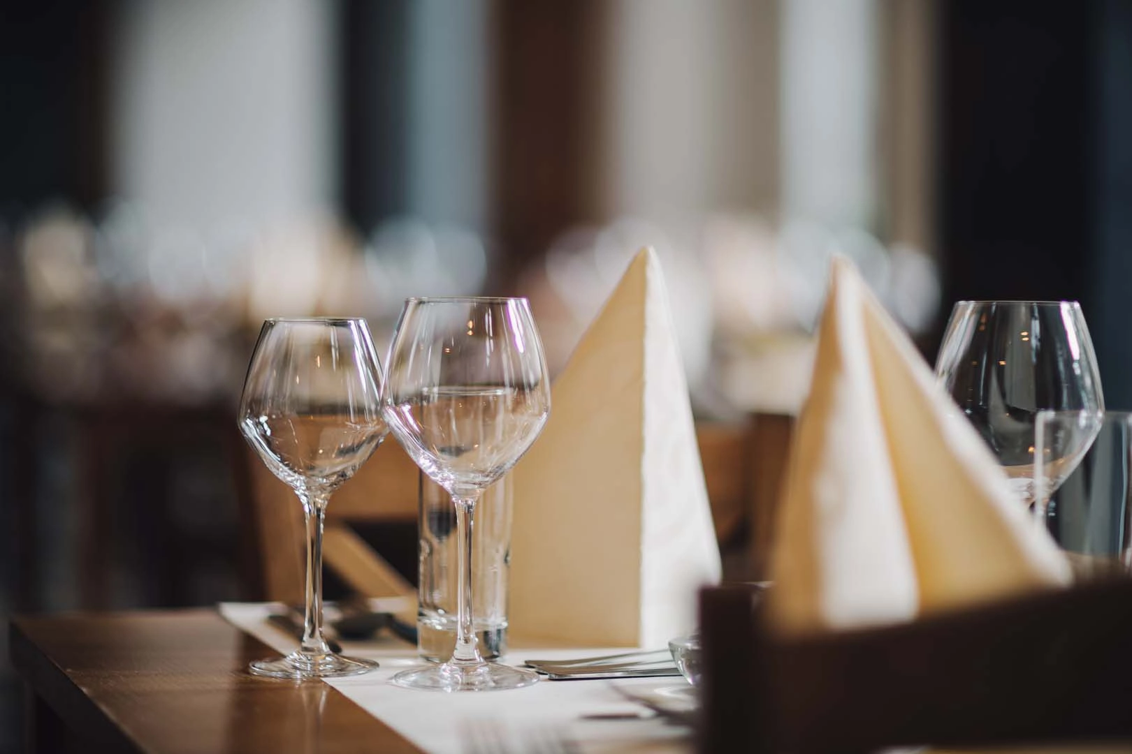Glasses on a table setting in a restaurant