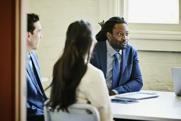 three people sat down