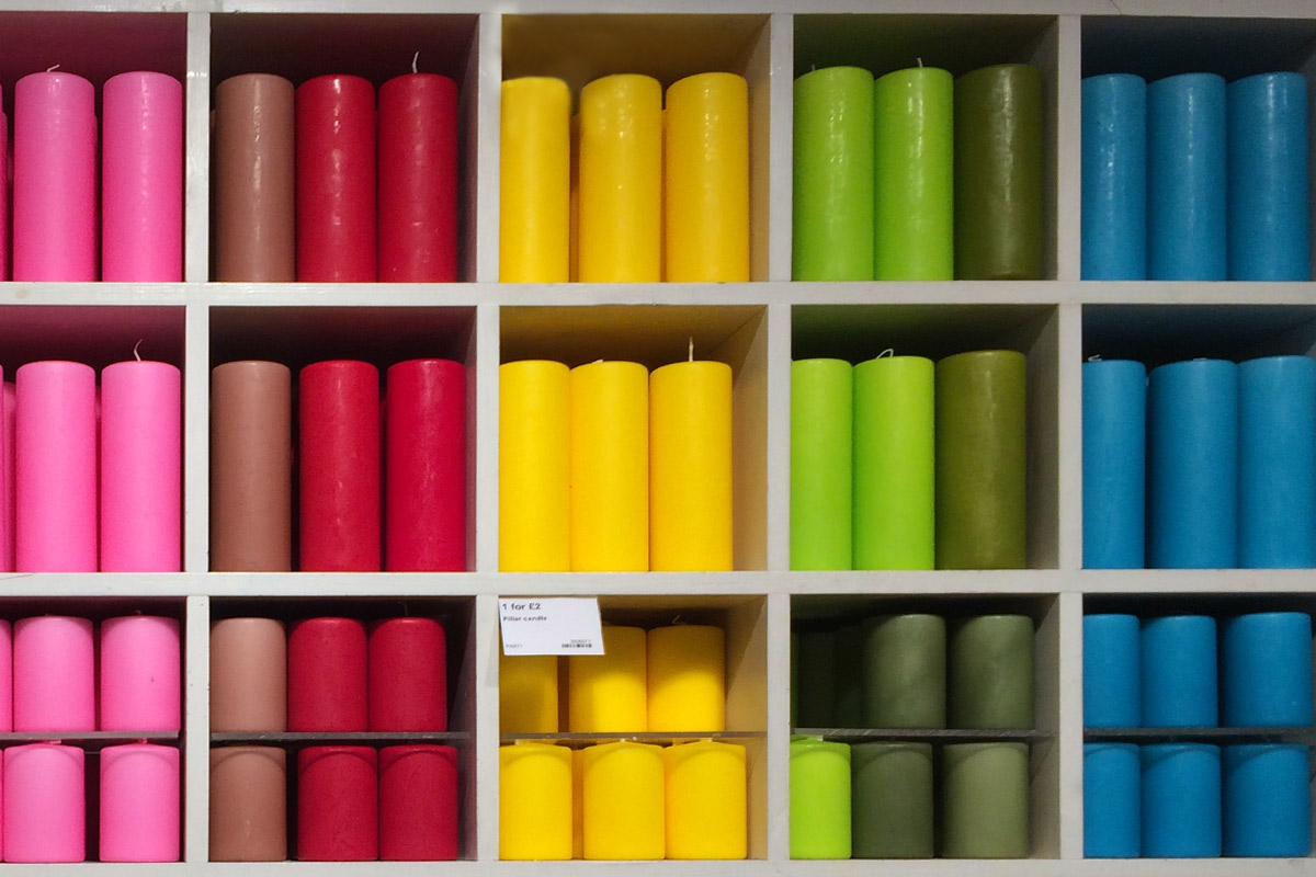 https-contenttilneycouk-media-1433-colourful-candles-on-a-shelf.jpg