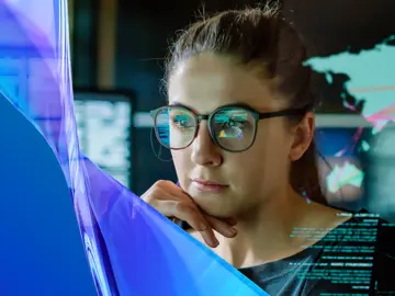 Woman studies screen