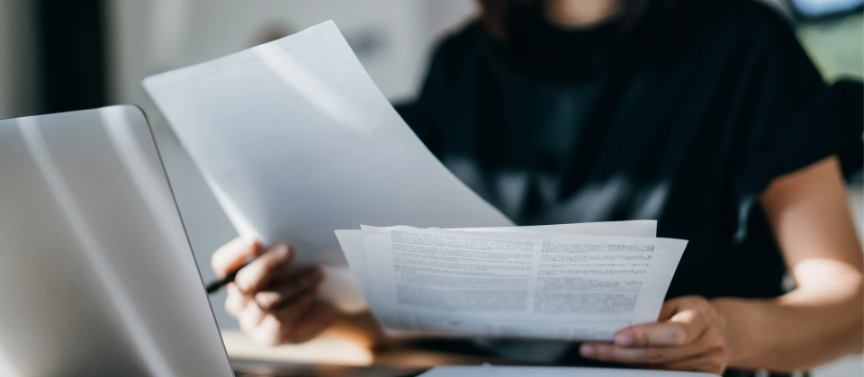 Woman with paperwork