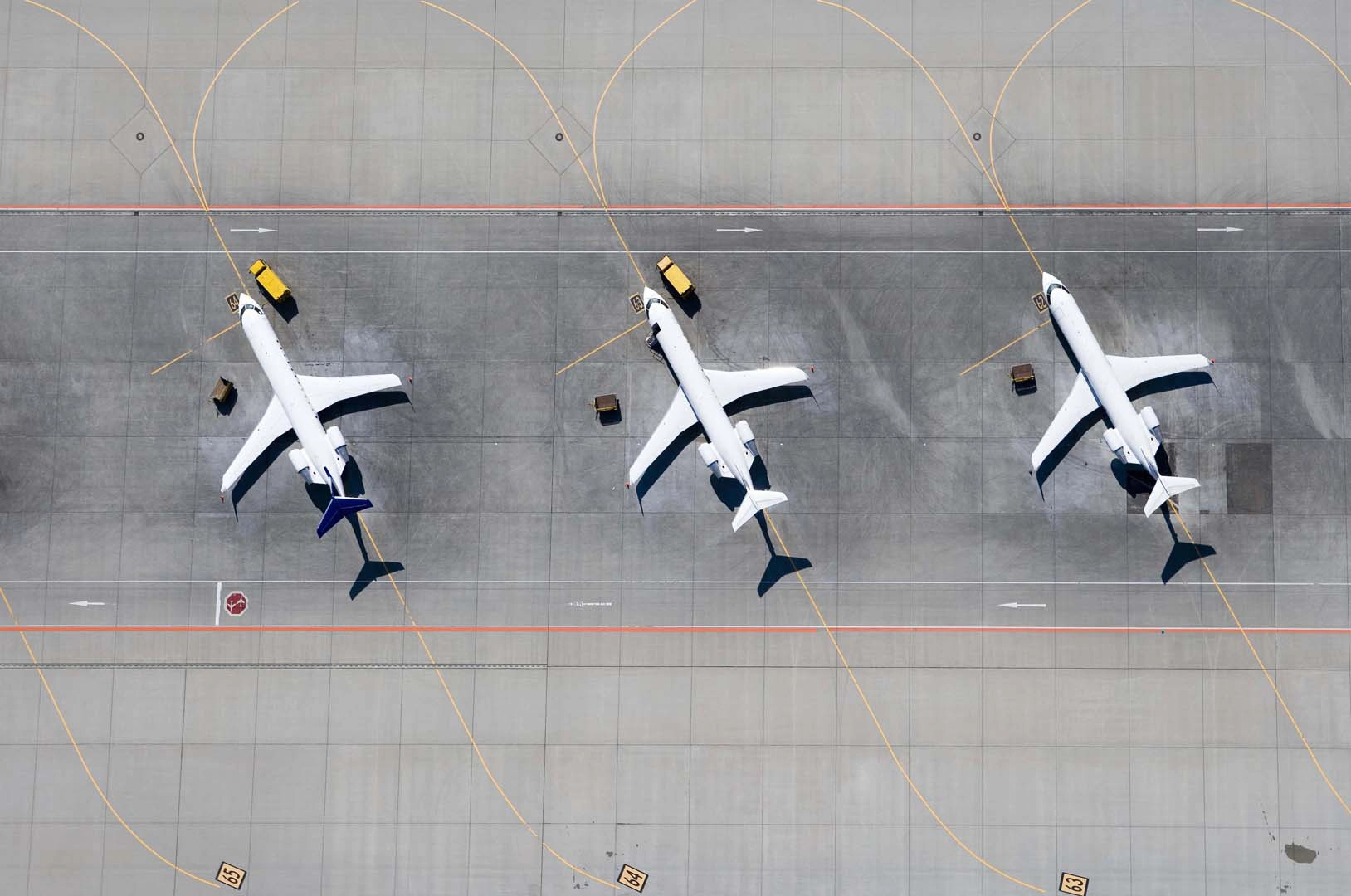 Three planes on runway from above