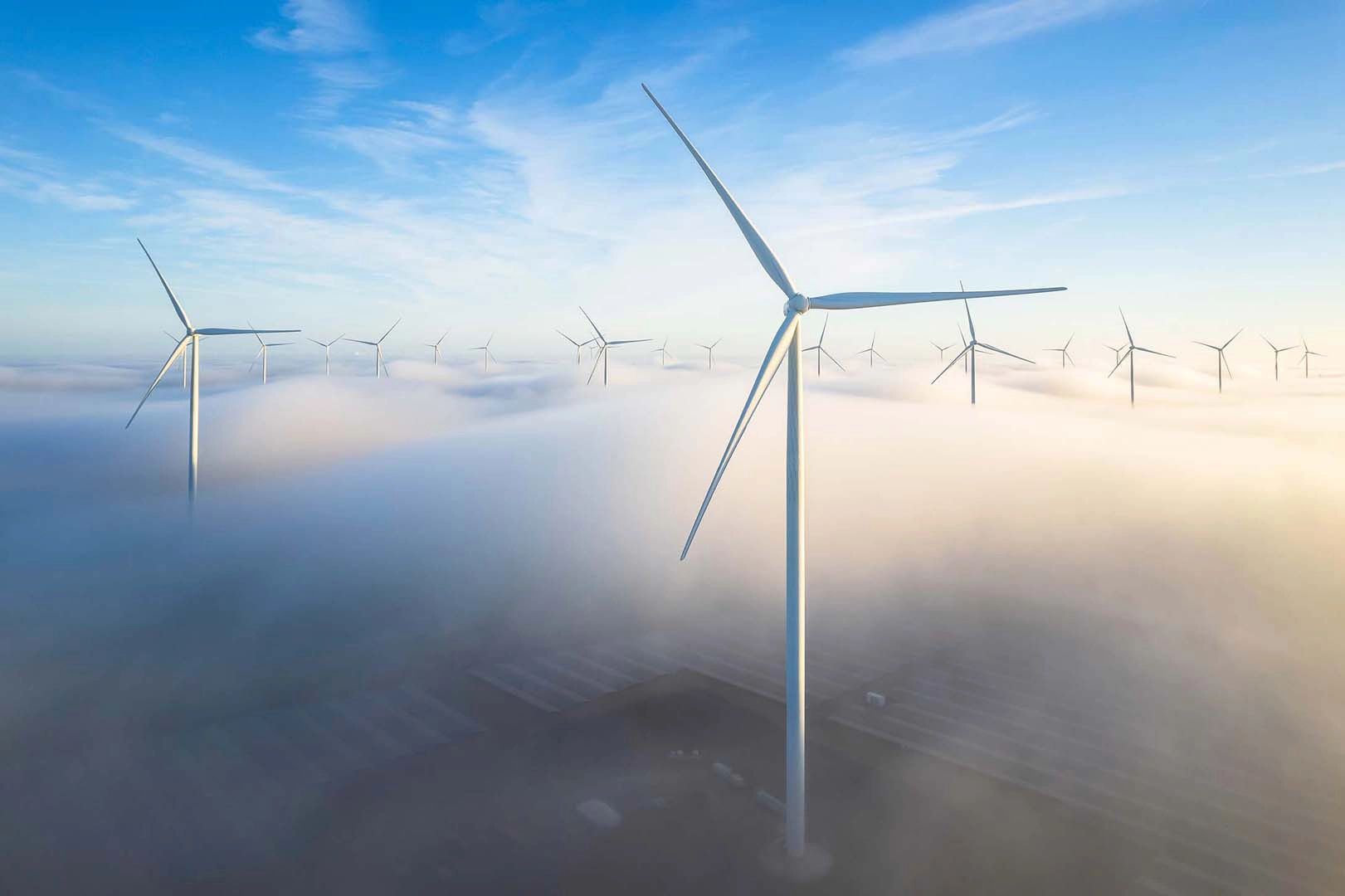 Wind turbines above clouds
