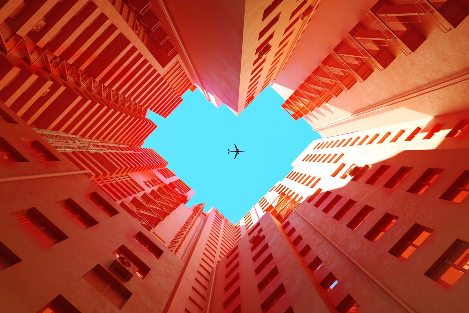 A plane between buildings