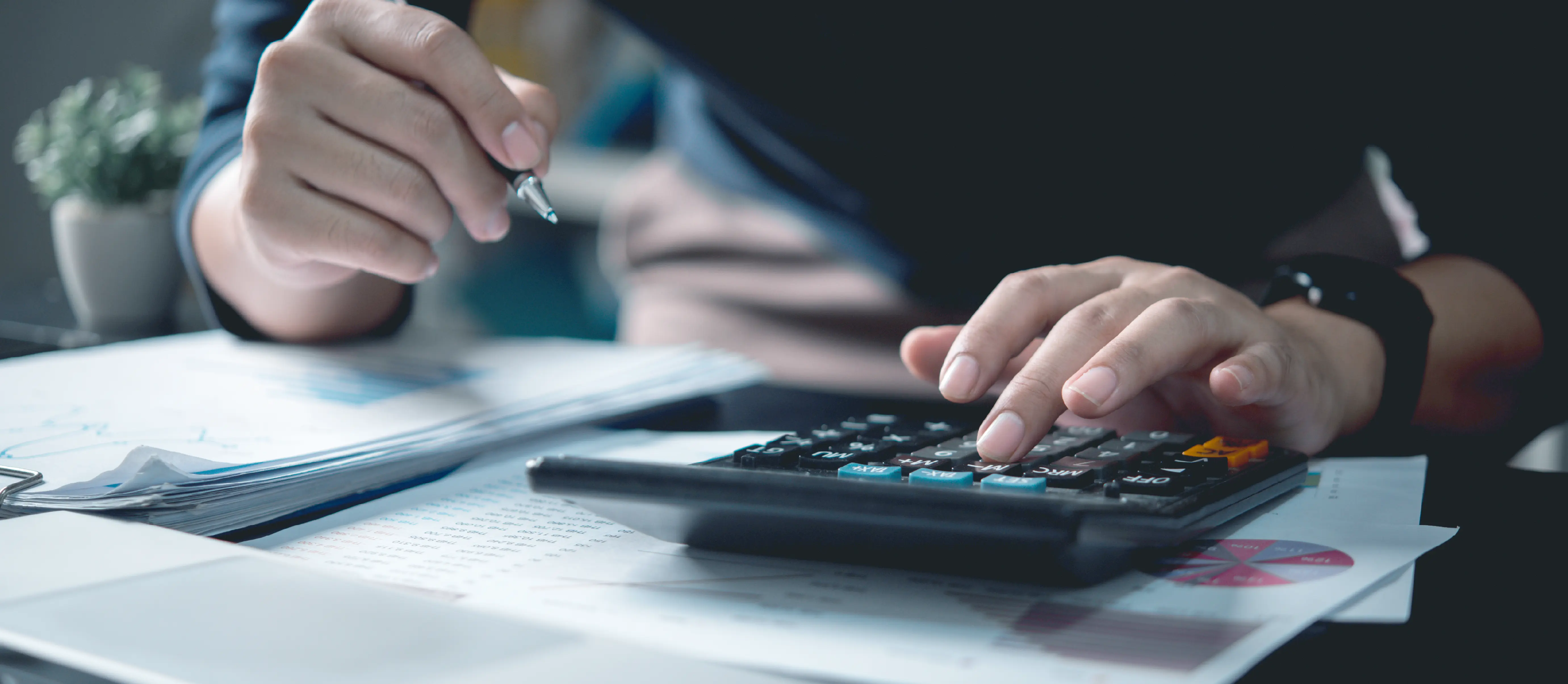 Person using calculator