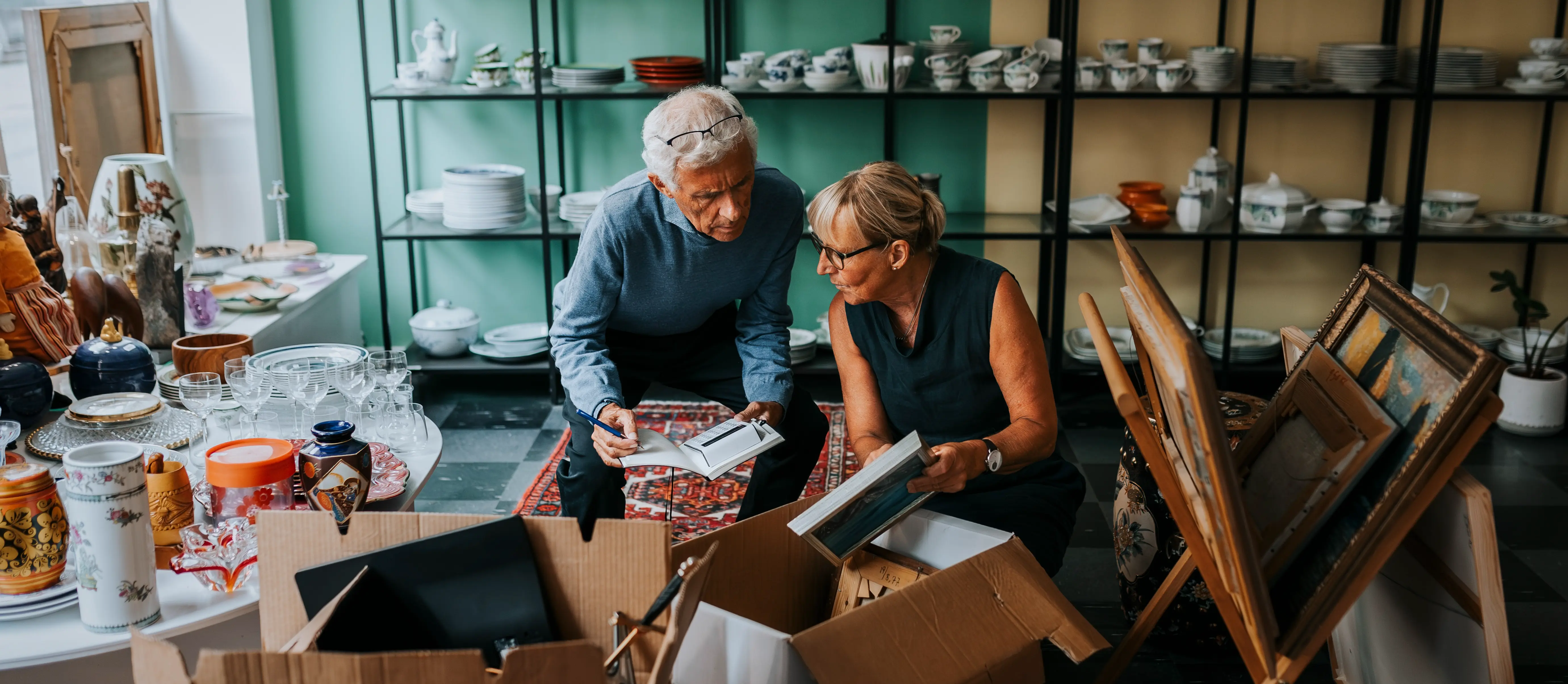 A couple adding up valuables
