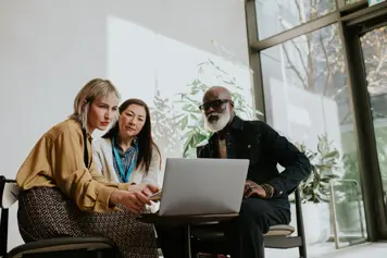 Three people talking